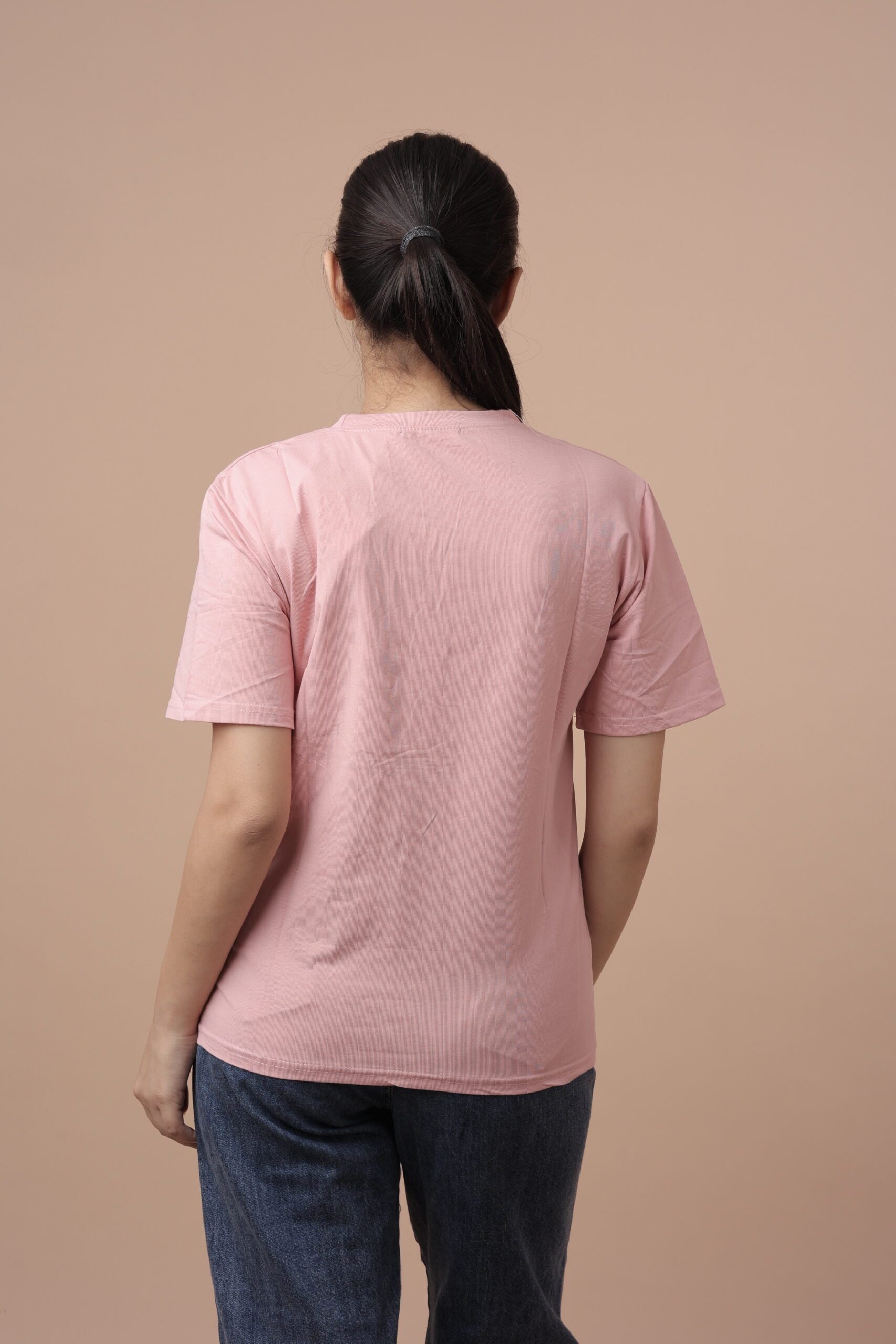 Here Tshirt (Pink) Add a Touch of Playful Elegance to Your Wardrobe!